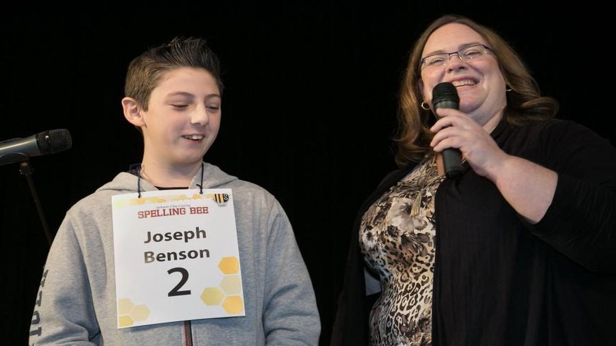 Joseph Benson, a seventh-grader at Antioch Middle School, was announced the winner of the Jackson-Clay County Spelling Bee by April Roy on Saturday at the Plaza branch of the Kansas City Public Library.