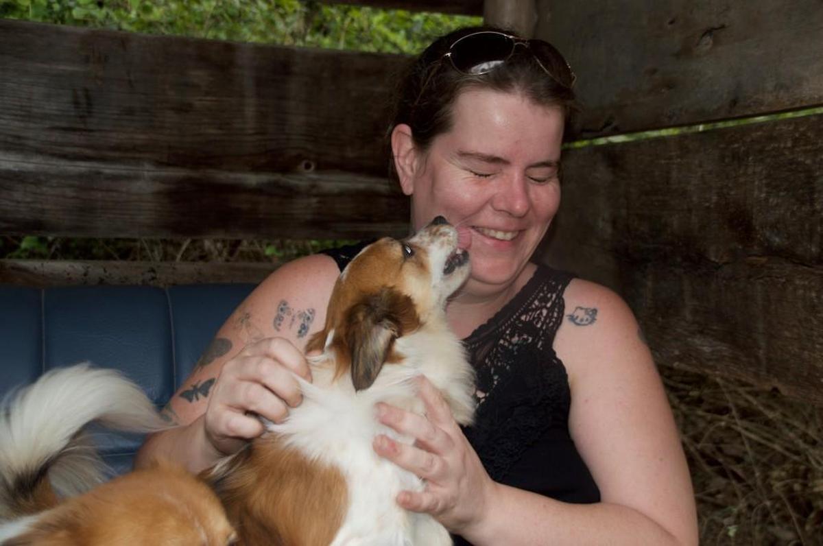 Kara Jo Koehler plays with her pups, Fitzie and Foxie, who follow her just about anywhere she goes in the community.
