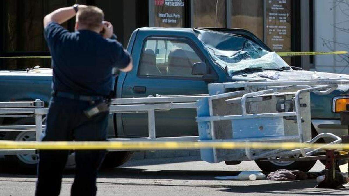 
Colton R. Frisbee, 23, fell out of a scissor lift as it was tipping over Thursday and landed on a truck. Part of the scissor lift then fell on top of him, fire officials said. 

