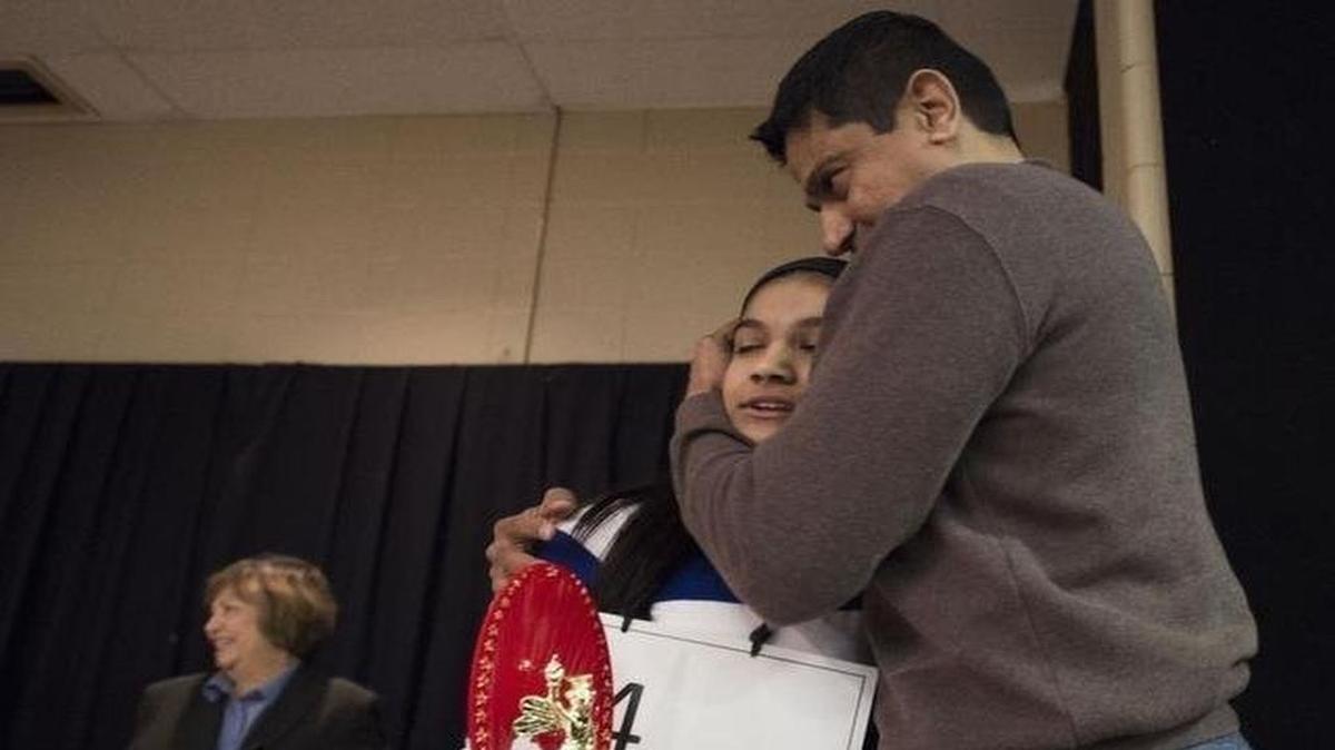 
Mirle Shivashankar hugged daughter Vanya Shivashankar after she claimed a spot at the Scripps National Spelling Bee for the fourth year in a row and the fifth time overall by winning the Olathe spelling bee at Frontier Trail Middle School on Feb. 12.
