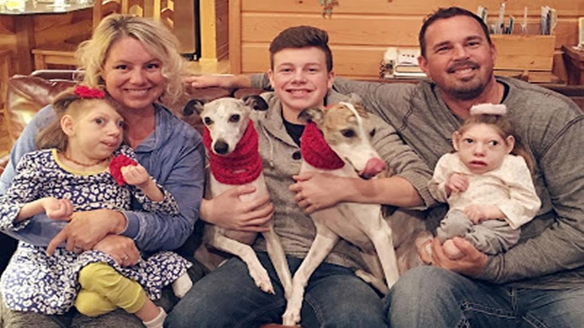 Gwen and Scott Hartley with their children (left to right) Claire, Cal and Lola.