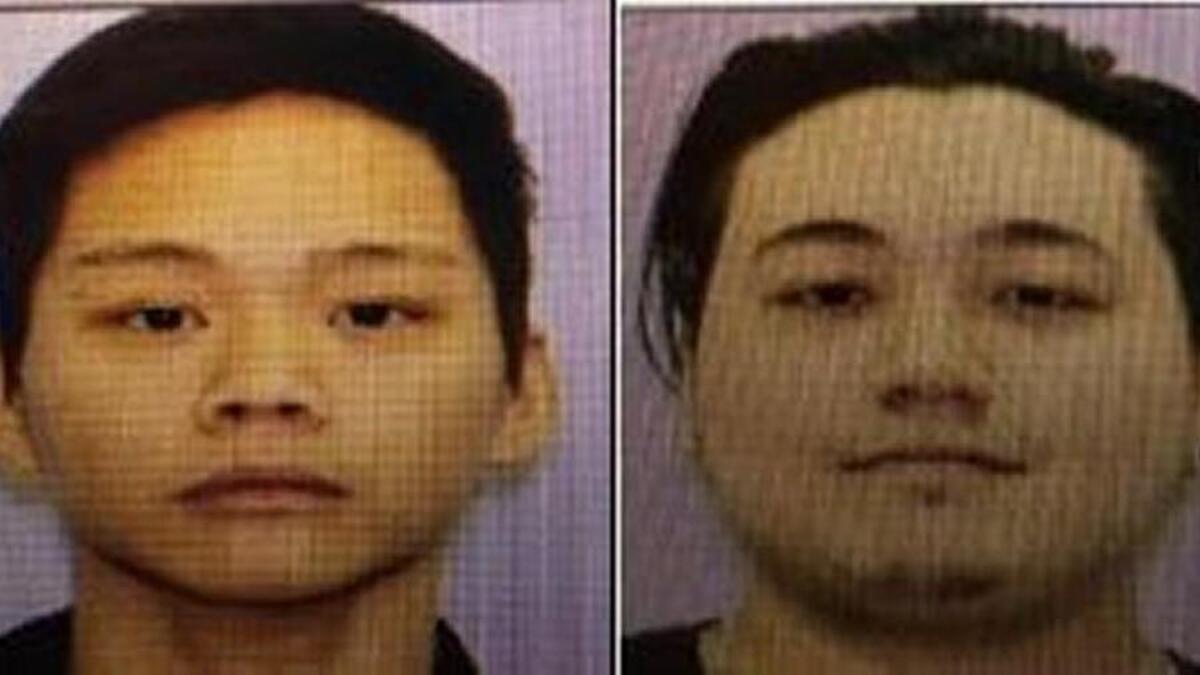 Jason A. Dela Cruz (left) and William L. Dela Cruz