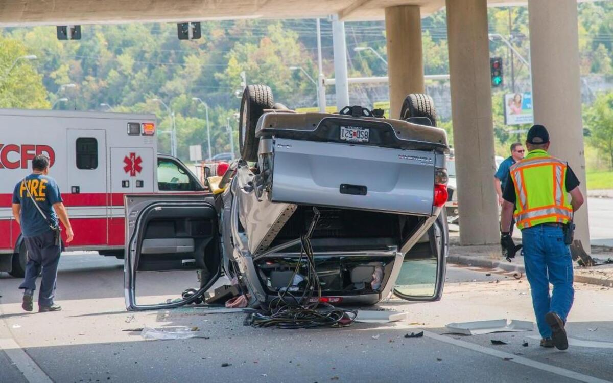 A vehicle that tumbled from northbound Interstate 435 onto 23rd Street ended up on its roof about 11:45 a.m. Tuesday. The driver later died at a hospital.