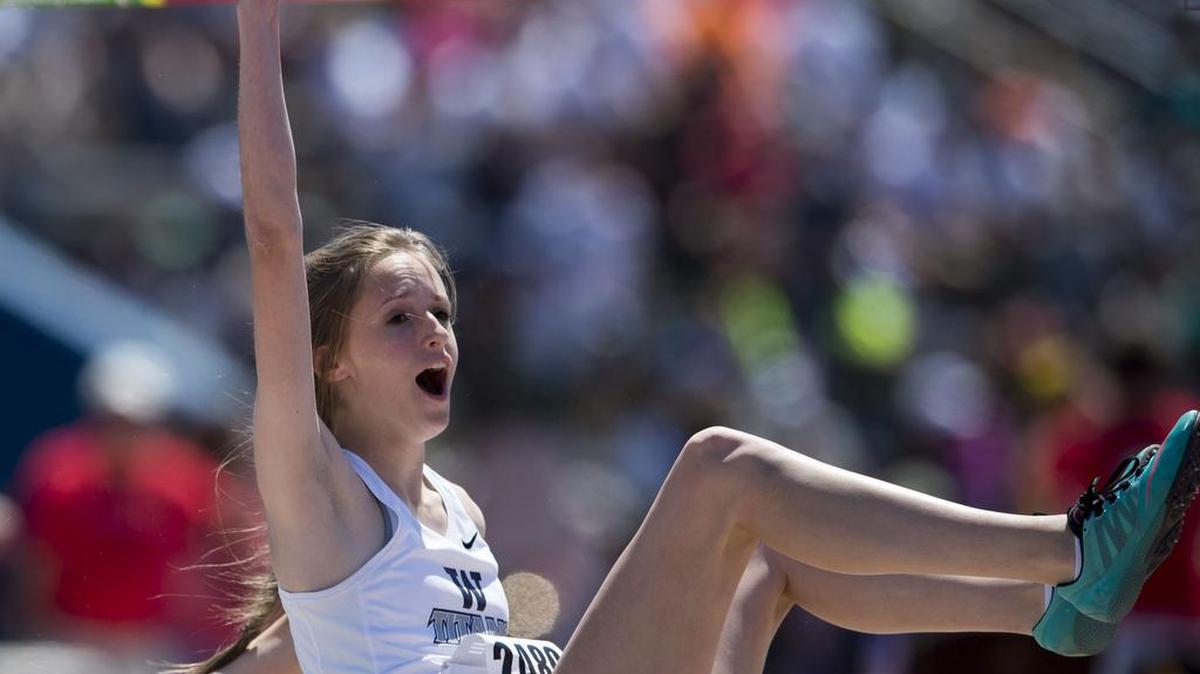 Lee's Summit West High School's high jumper Jessica Haney pumped her fist after clearing a height of 5' 6" during the Kansas Relays at Rock Chalk Park on Saturday, April 23, 2016 in Lawrence, Kansas.