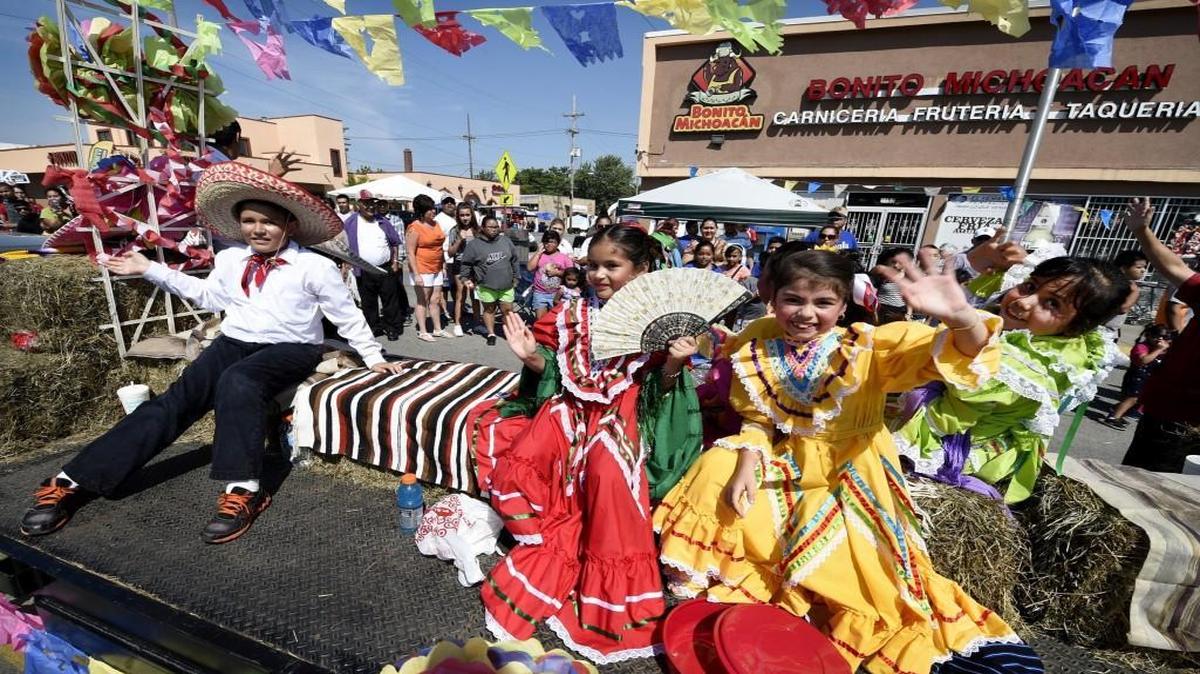 
A parade celebrating Hispanic Heritage Month featured marchers and floats, then ended outside the Bonito Michoacan restaurant in Kansas City, Kan., for a street fair Saturday. 

