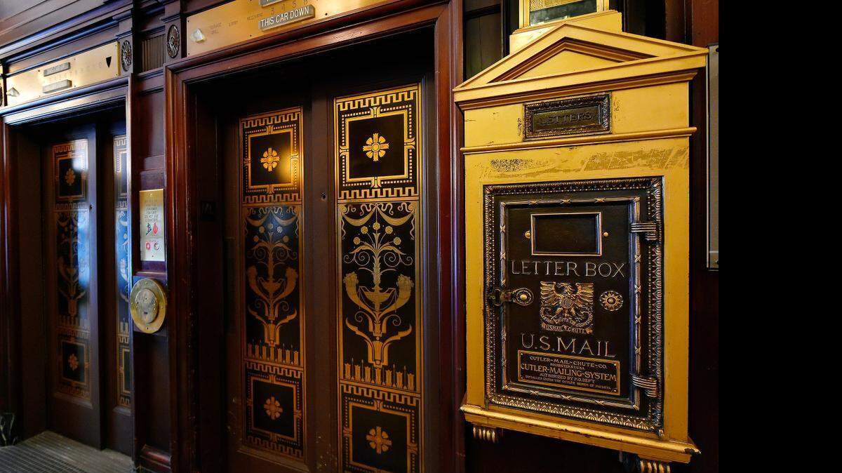
The letter box and elevators in the lobby of the Muehlebach Hotel, which is celebrating its 100th year of existence. The hotel used to be the social hub of Kansas City. Harry Truman used it so much that it became known as the "other White House." 
