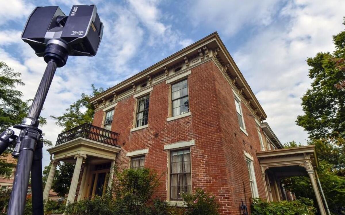 
Burns & McDonnell engineers used a Faro Focus 3D laser scanner (left) to determine where the pre-Civil War Owens-McCoy House brick facade is shifting, which helps direct renovation efforts. The technology, typically used to document industrial construction, could be a big help for historic preservation.
