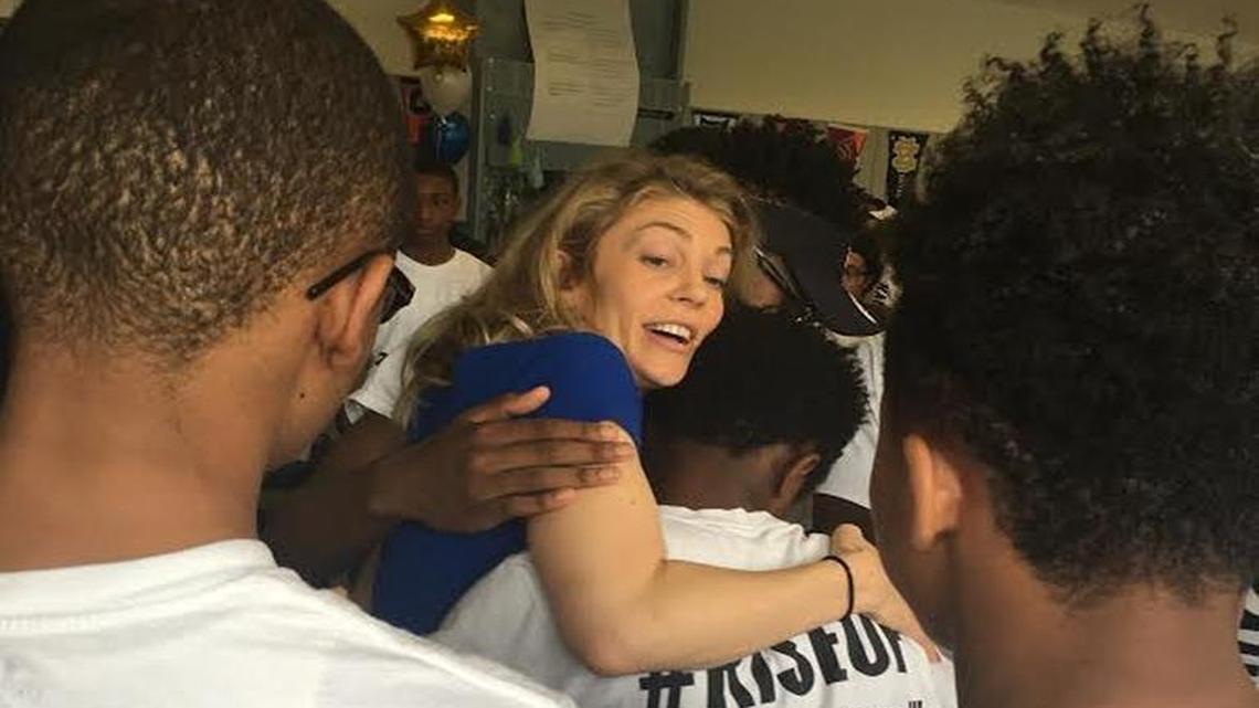Kauffman School CEO Hannah Lofthus got hugs from students after hearing she won the Ryan Award for leading the Kansas City charter to a high achieving level.