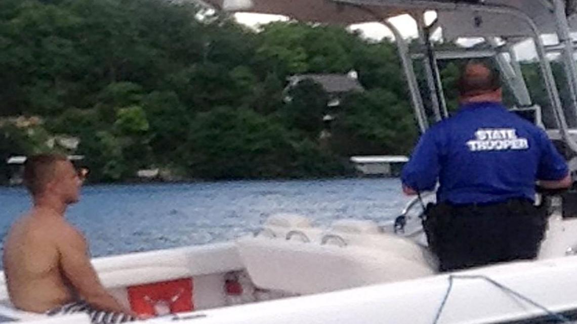 During Brandon Ellingson’s arrest on May 31, 2014, one of his friends took this photograph of him on Trooper Anthony Piercy’s boat.