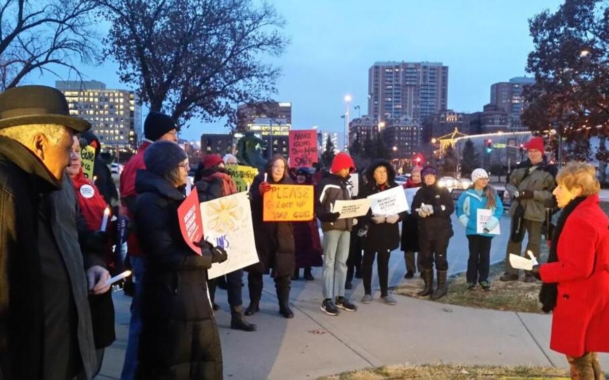 Judy Sherry (right), president of the Kansas City chapter of Grandparents Against Gun Violence, delivered a speech on gun violence Wednesday during a vigil to commemorate the Sandy Hook Elementary School shooting tragedy in Newtown, Conn., on Dec. 14, 2012.