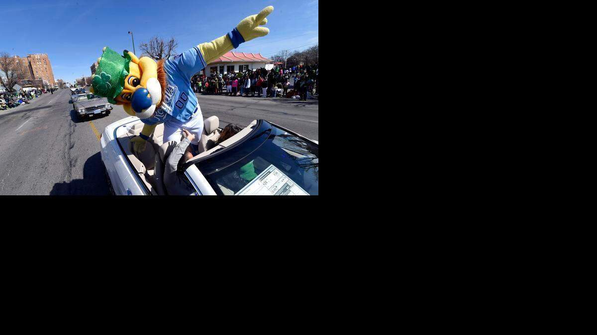 
Kansas City Royals mascot Sluggerrr hams it up for the crowd during Tuesday's annual St. Patricks Day Parade on March 17, 2015, in Kansas City, Mo.
