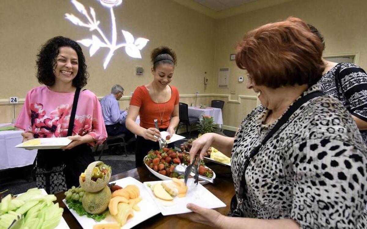 
The Mother’s Day buffet at the Asado Urban Grill restaurant in the Hilton Kansas City Airport hotel was a treat Sunday for Rosann Birdsong (left) and her daughter Jalia Birdsong, 13, accompanied by Rosann's mother, Anna Mae Biancavilla.
