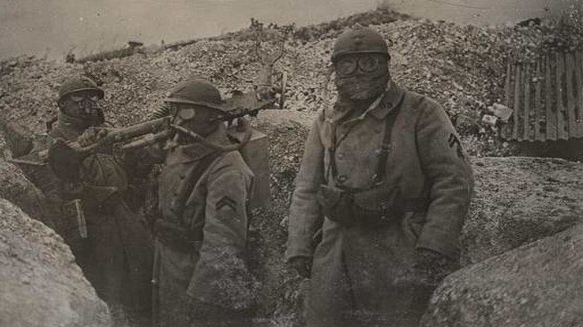 
World War I was truly the first modern war because of the use of advanced military strategies, chemical weapons, improvements in communications, aviation and other forms of technology. This photo from the National World War I Museum at Liberty Memorial shows soldiers wearing protective gas masks in the trenches.
