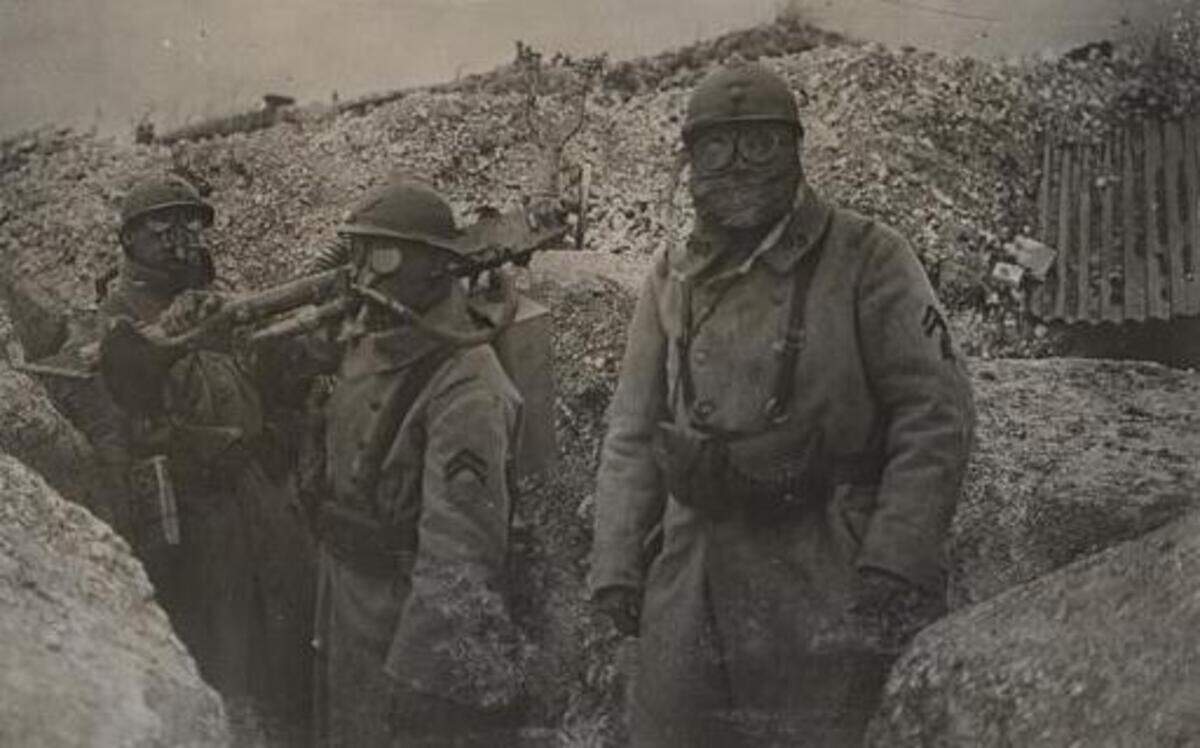 
World War I was truly the first modern war because of the use of advanced military strategies, chemical weapons, improvements in communications, aviation and other forms of technology. This photo from the National World War I Museum at Liberty Memorial shows soldiers wearing protective gas masks in the trenches.
