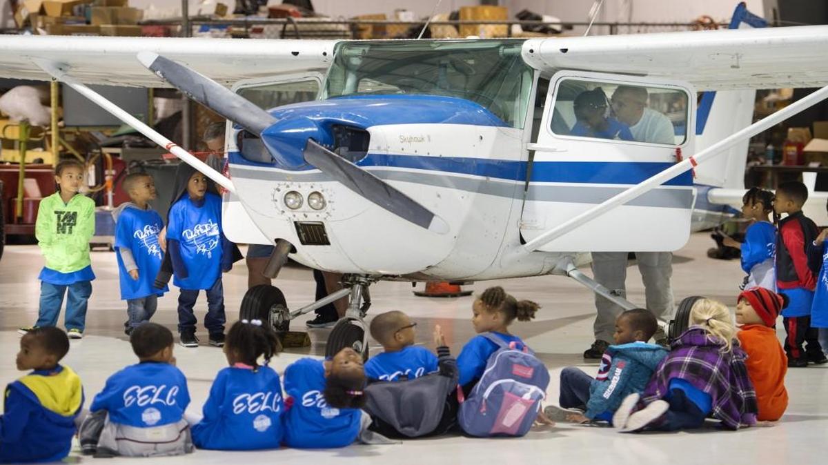 More than 500 children participated Friday in the Ervin Early Learning Center Fly Day at the Lee’s Summit Municipal Airport. Take Flight Inc. helped sponsor the event so that kids could sit in various airplanes and look over a helicopter, fire trucks and a police car.