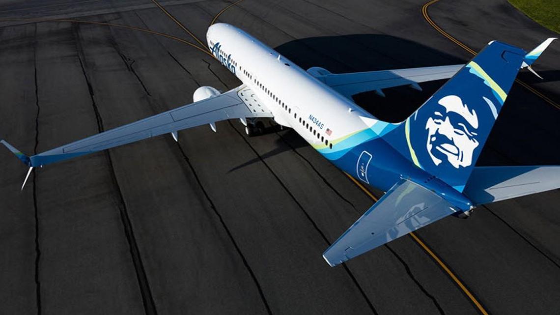 A 32-year-old woman was charged with interfering with members of a flight crew after an Alaska Airlines flight from San Francisco to Chicago was diverted to Kansas City International Airport Friday.