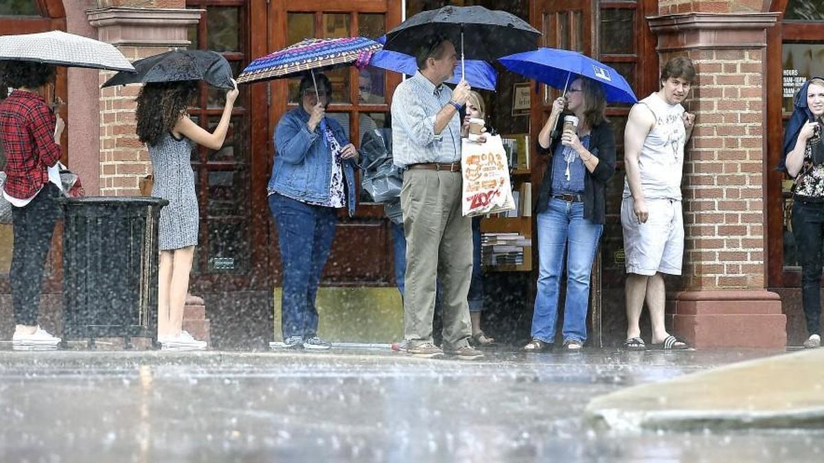 Keep the umbrellas handy because it’s going to be a stormy and steamy week in the Kansas City area this week. Expect for uncomfortable humidity levels. Shoppers on the Country Club Plaza (above) pulled out their umbrellas during a spring rainstorm in 2015.