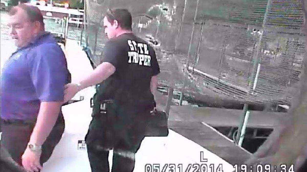 
A Missouri Highway Patrol boat camera recorded Trooper Anthony Piercy (left) with an unidentified trooper after Brandon Ellingson drowned May 31.
