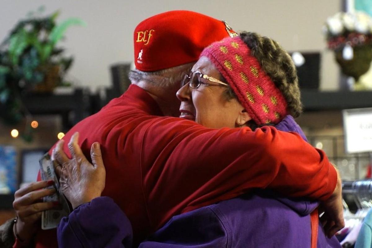 Sharon Bosse of Mayetta, Kan., was thrilled when Secret Santa handed her a $100 bill. She has cancer and was in Topeka for a doctor’s appointment when she met Secret Santa in a thrift store.