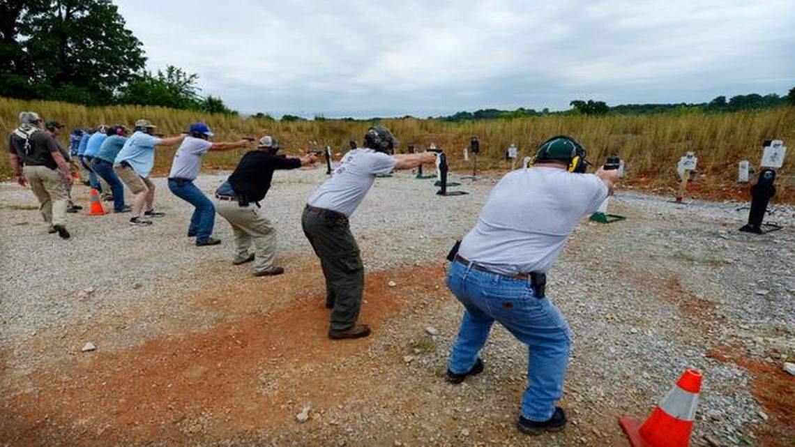 
Near West Plains, Mo., teachers and administrators (above) trained to stop armed school intruders. Instructors made sure they passed muster.
