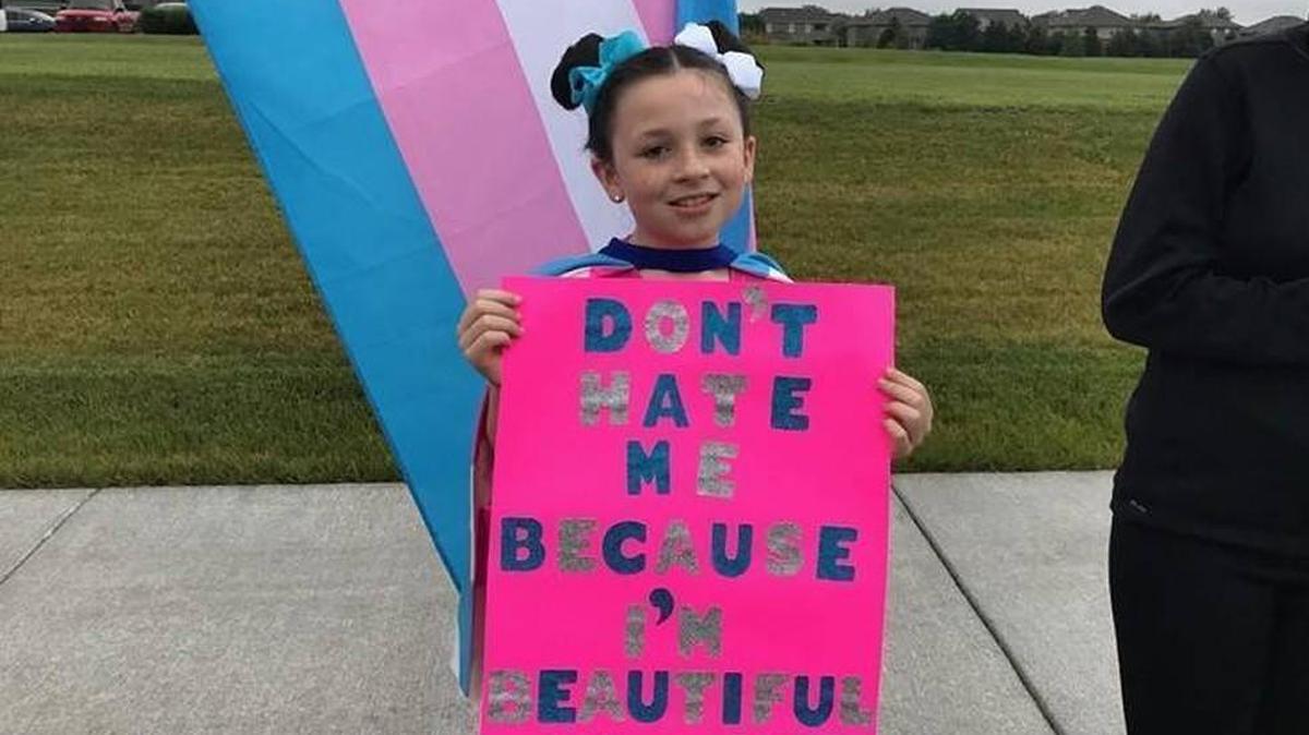 Izzy Scofield, a 9-year-old trans girl, showed her support for LGBT students in September at Olathe Northwest following hate at the school’s homecoming.