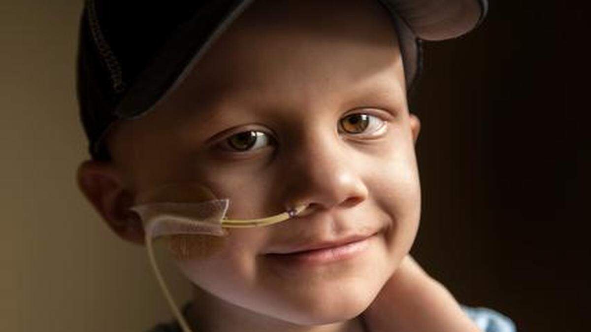 
Diagnosed in April with a rare form of cancer, 7-year-old Noah Wilson of Olathe had a good reason to smile Tuesday. His cancer is in remission, and his family is thrilled.
