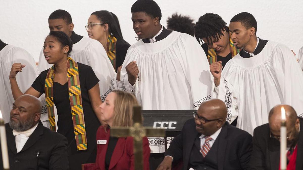 Religious leaders sat on stage as members of the Kansas City Boys Choir and Kansas City Girls Choir performed during last year’s Greater Kansas City Martin Luther King, Jr., Interfaith Service on Jan. 8, 2016, at Community Christian Church in Kansas City.