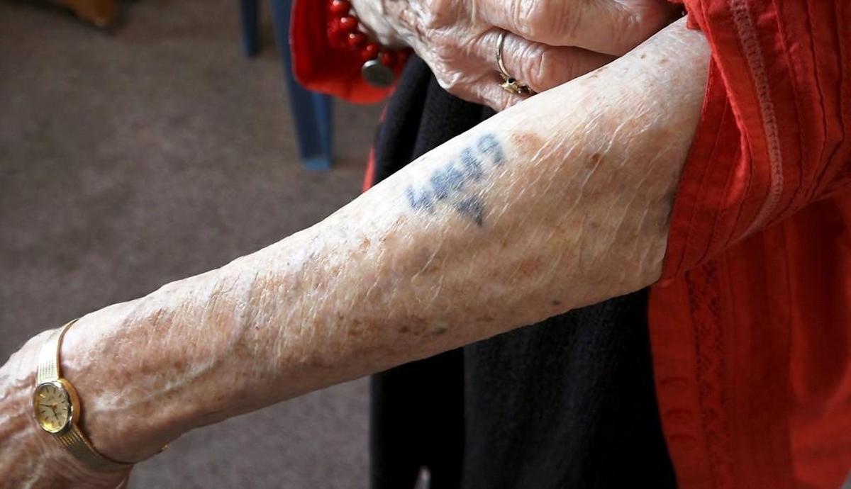 Holocaust survivor Sonia Warshawski reveals her concentration camp tattoo.