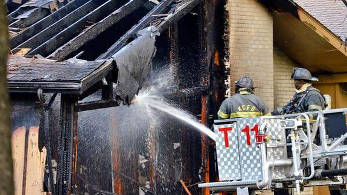 Firefighters battled a house fire Wednesday evening in the 9100 block of Tennessee Avenue in Kansas City. At least four people were injured, two critically, in the south Kansas City blaze. Neighbors reportedly helped at least two of the victims escape the burning structure.