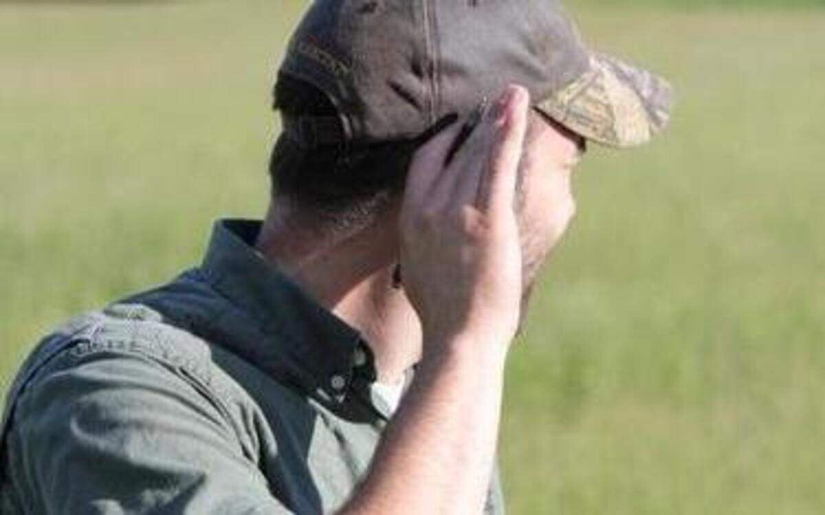 
A volunteer stops and listens for bird calls during early morning breeding bird surveys conducted in June. More volunteers are needed. 
