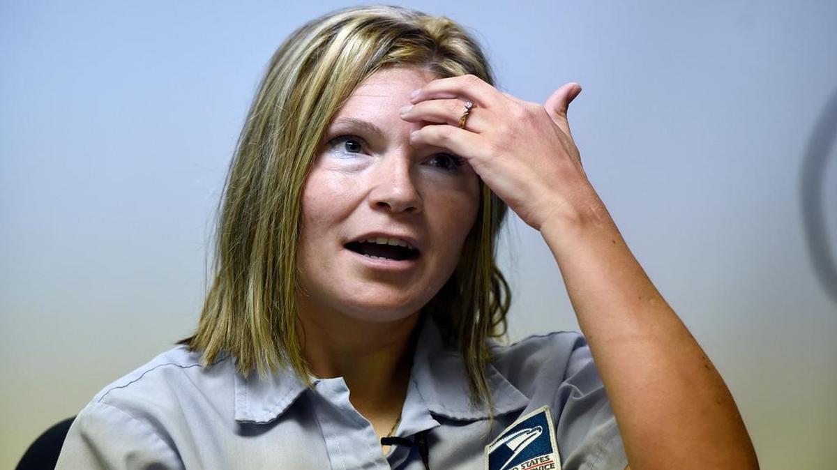 
Kandy Almond, a carrier for the United States Postal Service, described being mauled in 2009 by two large dogs while on her route on the city's east side. Two men who happened to be nearby saved her from further injury, but it still took months for her to recover.
