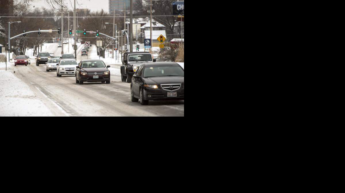 
Traffic on Southwest Trafficway was moving along without incident Monday morning following a Sunday night snow that covered the metro area.
