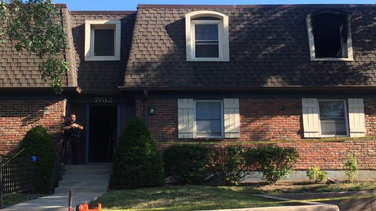 
A scorched second-floor window indicates where James Arthur Stoker, 74, of Overland Park, died after a fire broke out in his condominium early Monday in the 7600 block of West 59th Terrace. Officials think a discarded cigarette ignited the blaze.
