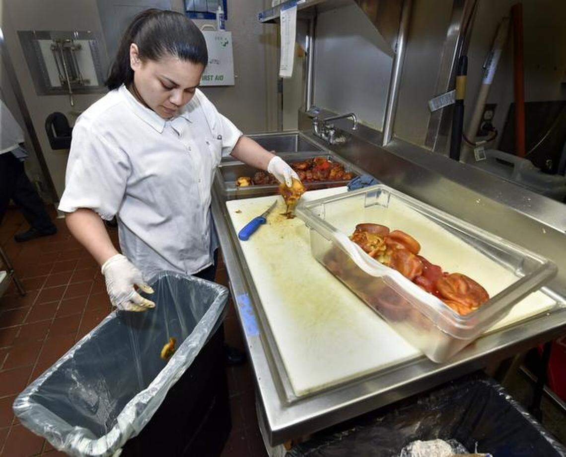 Prep cook Hope Chogwemai at Trezo Mare, one of three Kansas City area restaurants that sued in federal court for losses sustained because of COVID-19.