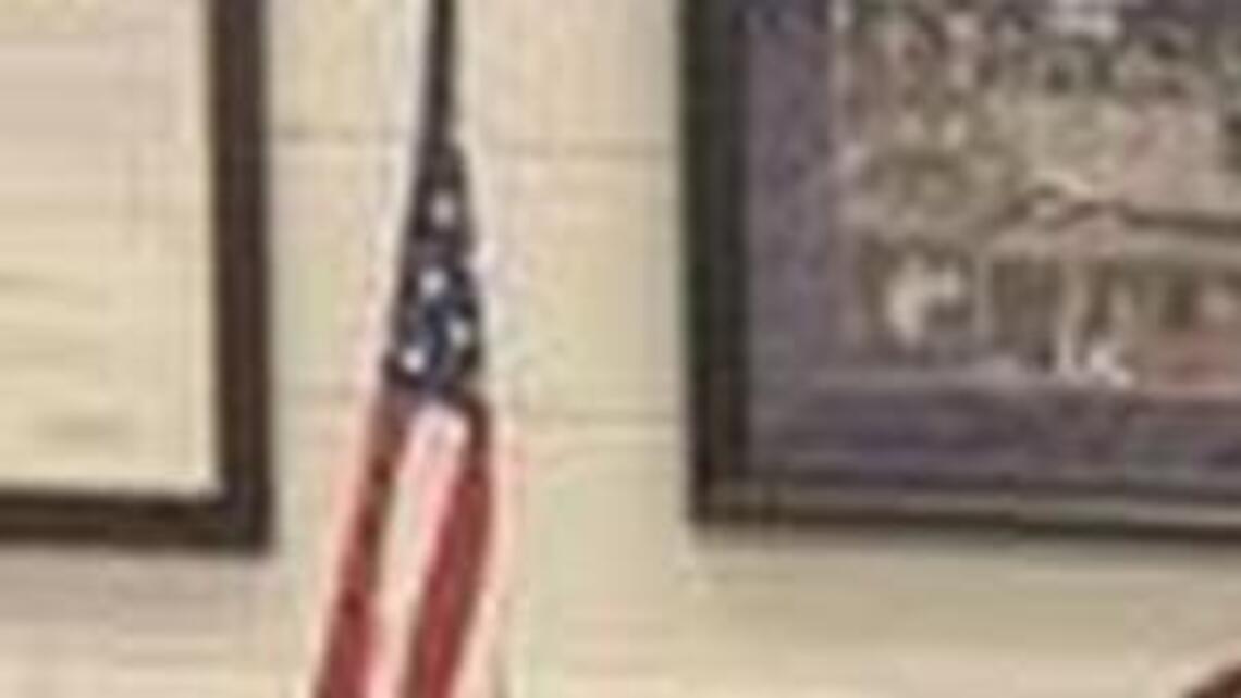 Grateful soldier presents flag to Pleasant Hill band