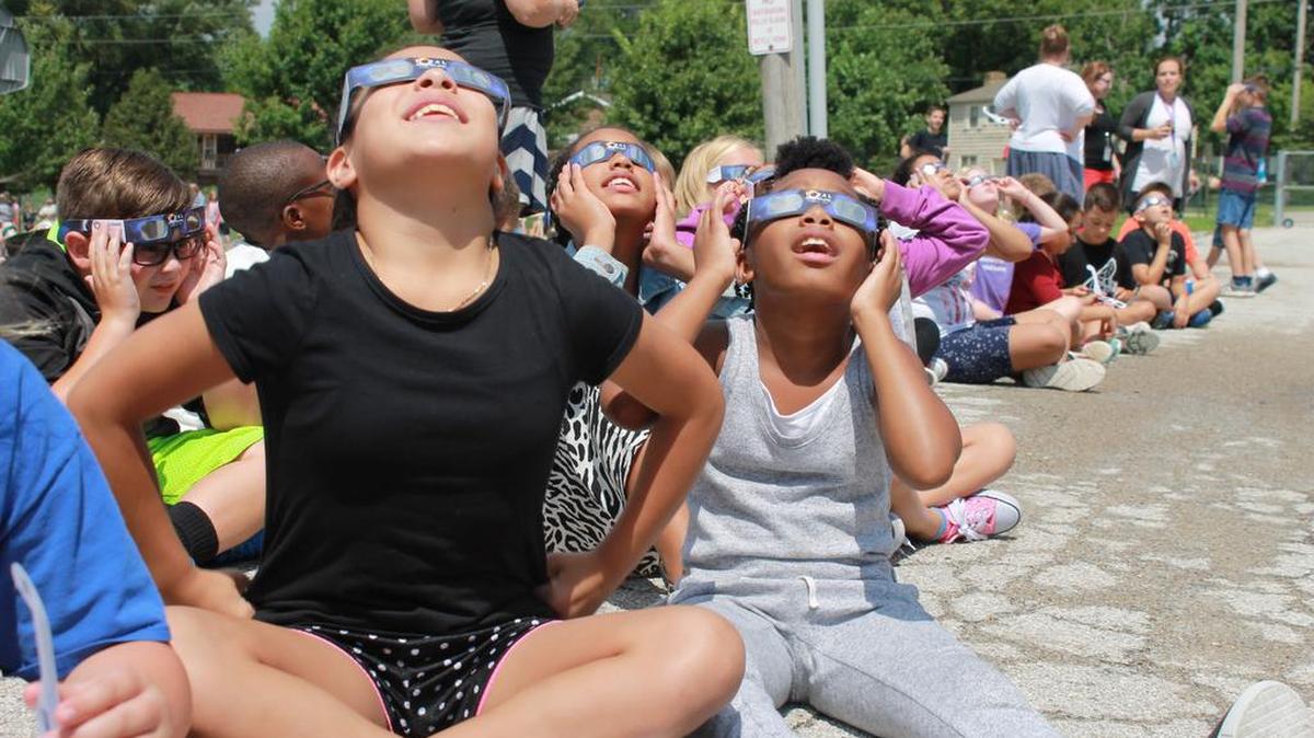 Students in third- and sixth-grade at Hillcrest STEAM Academy in Belton went outside to view a partial eclipse Monday, Aug. 21, 2017.