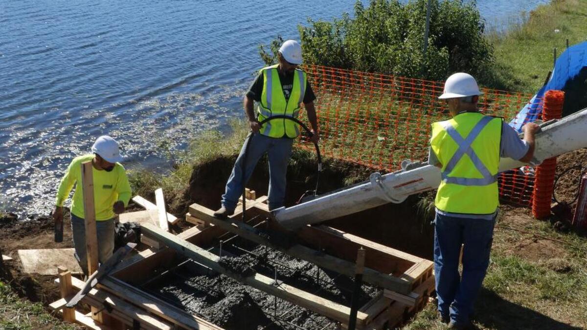 In mid-September, construction workers finished the cement after a pour for a new bridge at Hawk Ridge Park Lake. The bridge is part of a larger project underway at the popular Raymore park. Most of the project is expected to be completed in spring 2019.