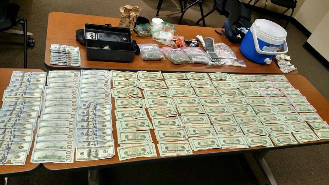 The Harrisonville Police Department shared this photo Oct. 16 of the drugs, cash, and paraphernalia seized during a weekend traffic stop at City Park. Darin W. Thomas, of Peculiar, was arrested and charged with two counts of felony delivery of a controlled substance.