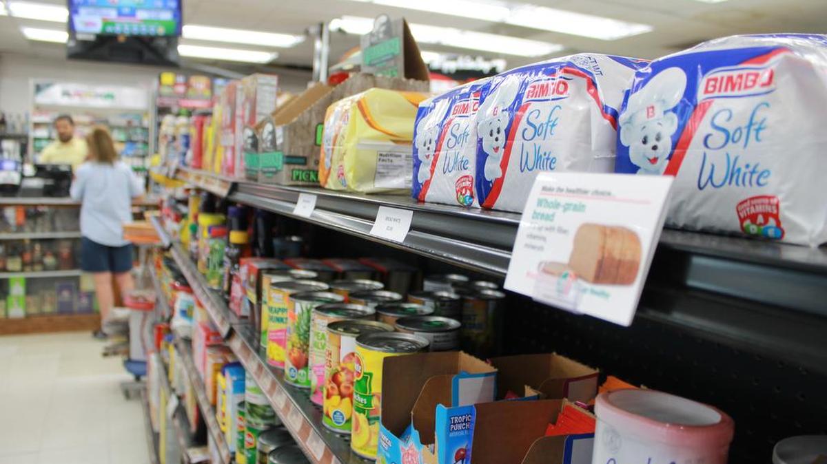 Inside Creighton Country Mart are grocery items — such as canned fruit, canned vegetables, whole wheat bread, milk, eggs, and water. The store’s shelves also have small signs highlighting healthy foods as part of the state’s “Stock Healthy, Shop Healthy” program. The manager at Creighton Country Mart said he decided to join the program earlier this year.