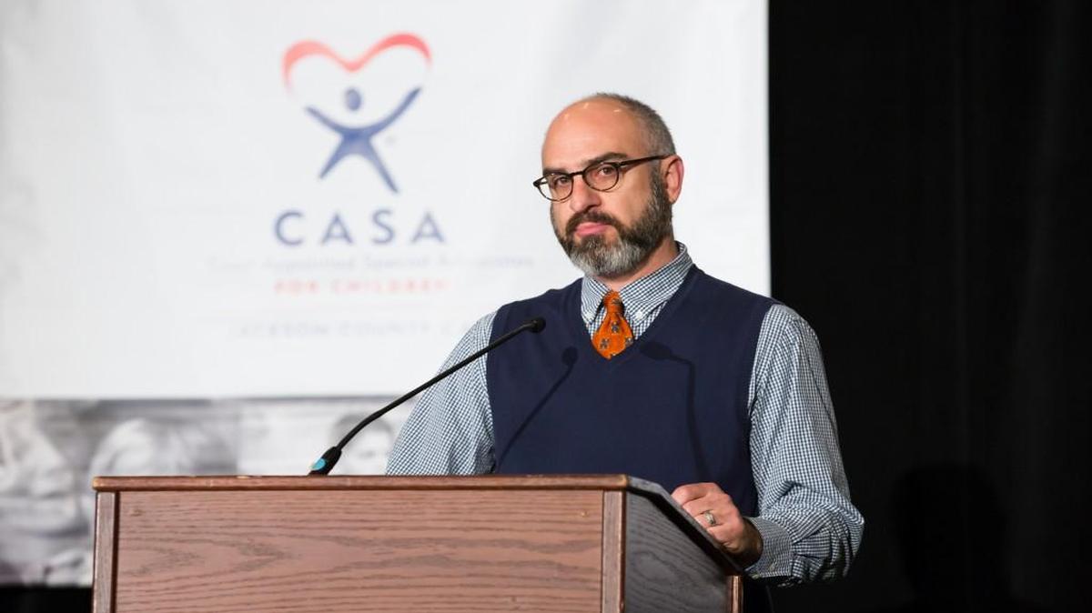 Matthew Gould spoke at the Jackson County CASA fundraising breakfast April 5, during which the Gould Charitable Foundation, created in honor of Gould’s late father, was recognized. The Giving Brick was a co-honoree.