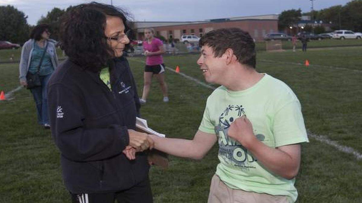 
During a Special Olympics soccer practice last week at Leawood Middle School, Nan Kanter took time to talk with athlete Spencer Giles, 27, of Overland Park.

 
