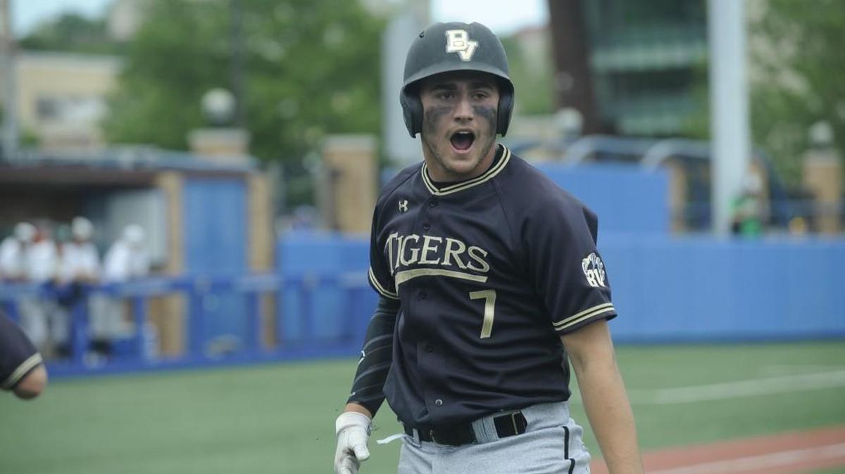 Walker Kinney and Blue Valley’s baseball team celebrated winning the Kansas Class 6A state championshihp last spring.