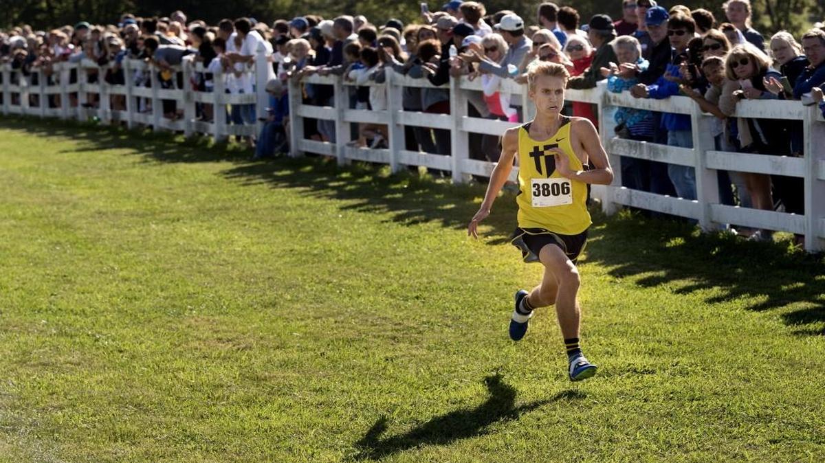 Ethan Marshall of St. Thomas Aquinas heads for the finish line Sept. 30, 2017, in the varsity boys’ race during the Greater Kansas City Cross Country Classic at Raymore-Peculiar. Marshall won with a time of 15 minutes, 55.90 seconds.