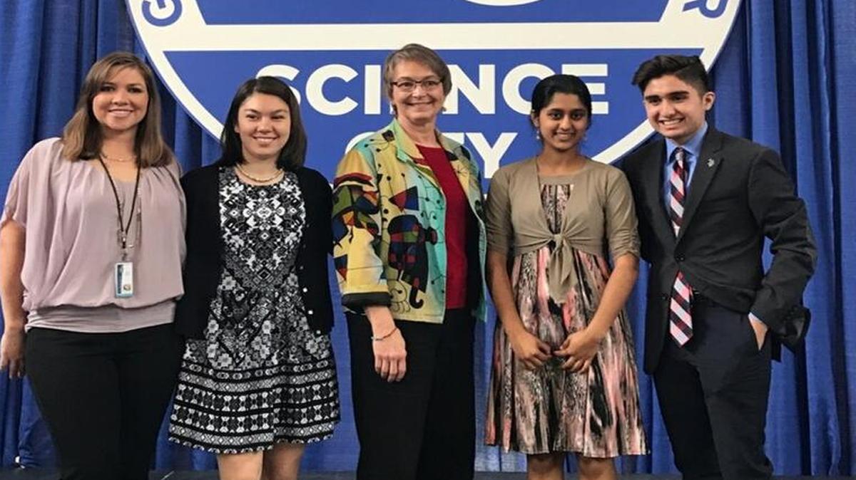 Grand Award winners at the 2017 Greater Kansas City Science & Engineering Fair included Andrea Dahl (second from left), Stuti Dalal (second from right) and Andy Cardona (right). (Erin Smith is not pictured.) They are shown with science fair director Emily Meyer (left) and LeAnn Smith (center), director of STEM programming and outreach at Union Station.
