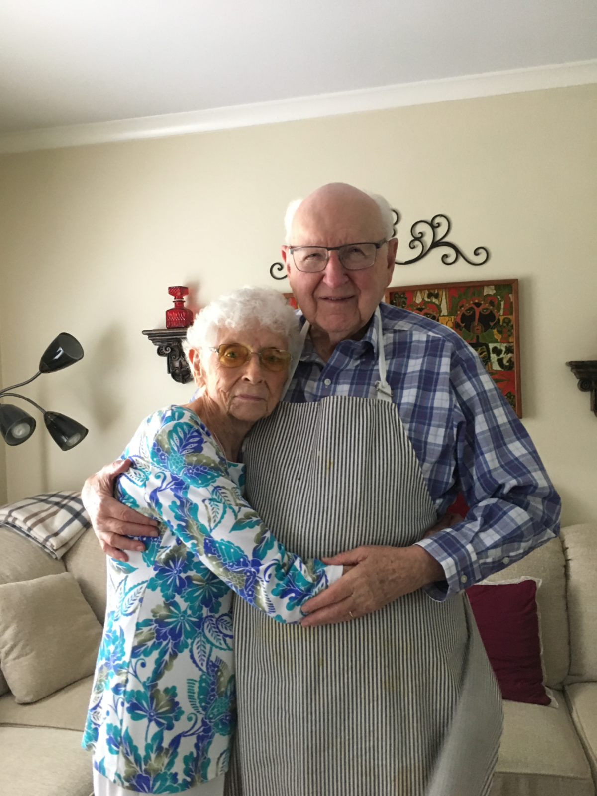 Kenneth and Carolyn Tebow, 98, prepare for Sunday dinner with family at their Westwood, Kan., home in 2017.