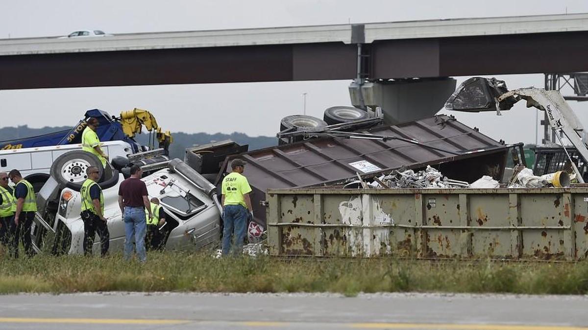 An overturned trash truck caused the closure of the ramp from northbound U.S. 69 Highway to westbound Interstate 435 in Overland Park on Wednesday, Aug. 6, 2014. Perhaps debris from that spill is still causing consternation for one columnist.
