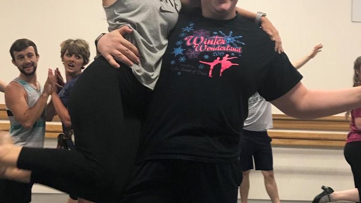 Ramsey Self and Alex Gumminger finish a dance number during a dress rehearsal.