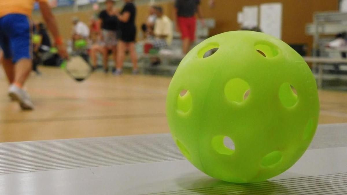 Pickleball is a cross between badminton, tennis and table tennis.