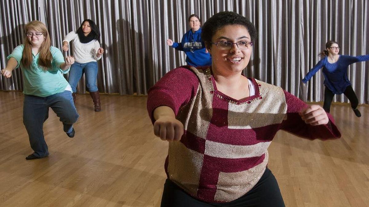 Paige Braden (foreground), Sara Piety (from left), Angel Montero, Alex Conner and Lucy Wagner break out some moves at the Lopez Dance-KC studio in Mission.