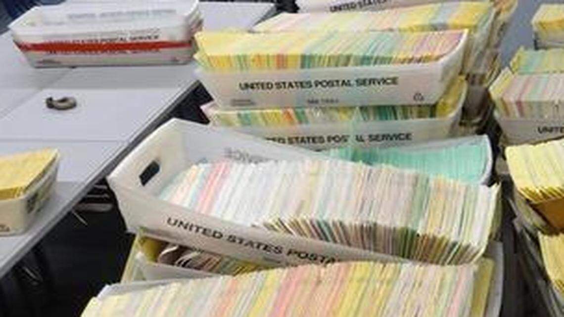 
Mail-in ballots were gathered at the Johnson County Election Office earlier this month for the school spending election. 
